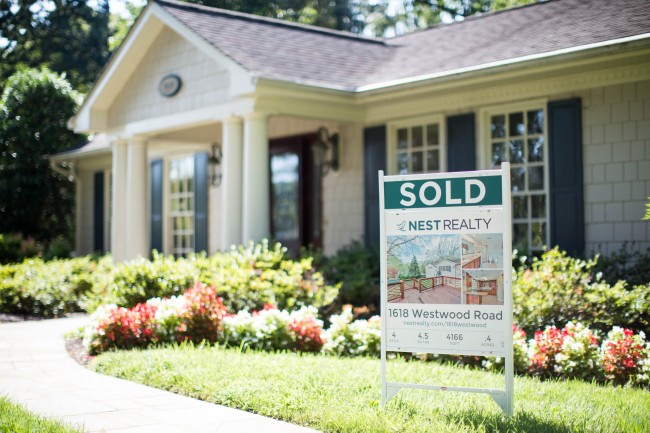 property values sold sign