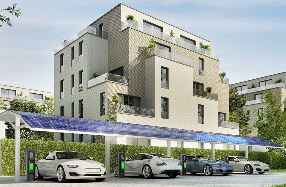 Modern parking for electric vehicles near luxury residential buildings